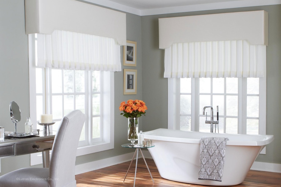 A stunning bathroom with Lutron shades.
